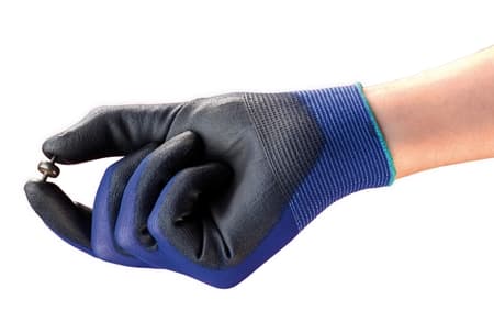 Hand wearing HyFlex 11-618 glove, holding a mechanical component